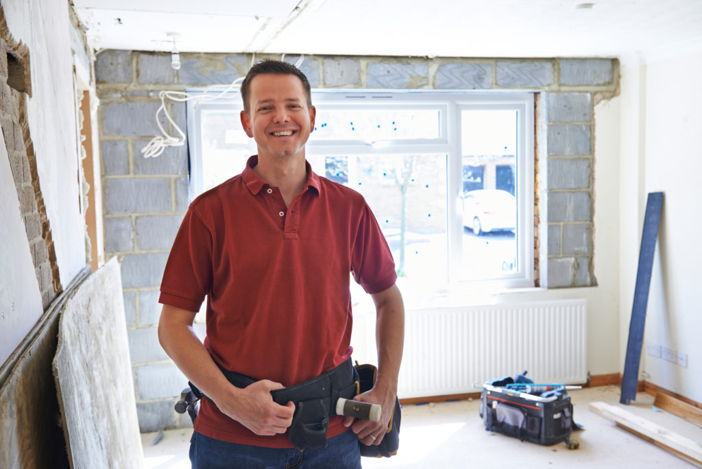 Portrait Of Builder Carrying Out Home Improvements